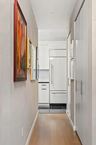 a picture of a bathroom with a bench