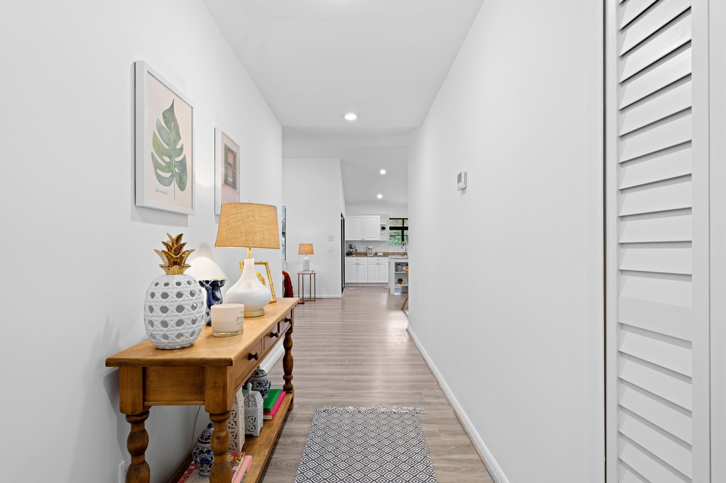 6894 Southeast Raintree Avenue Stuart, FL 34997 - Photo 2 of 24 Light & Bright Entryway