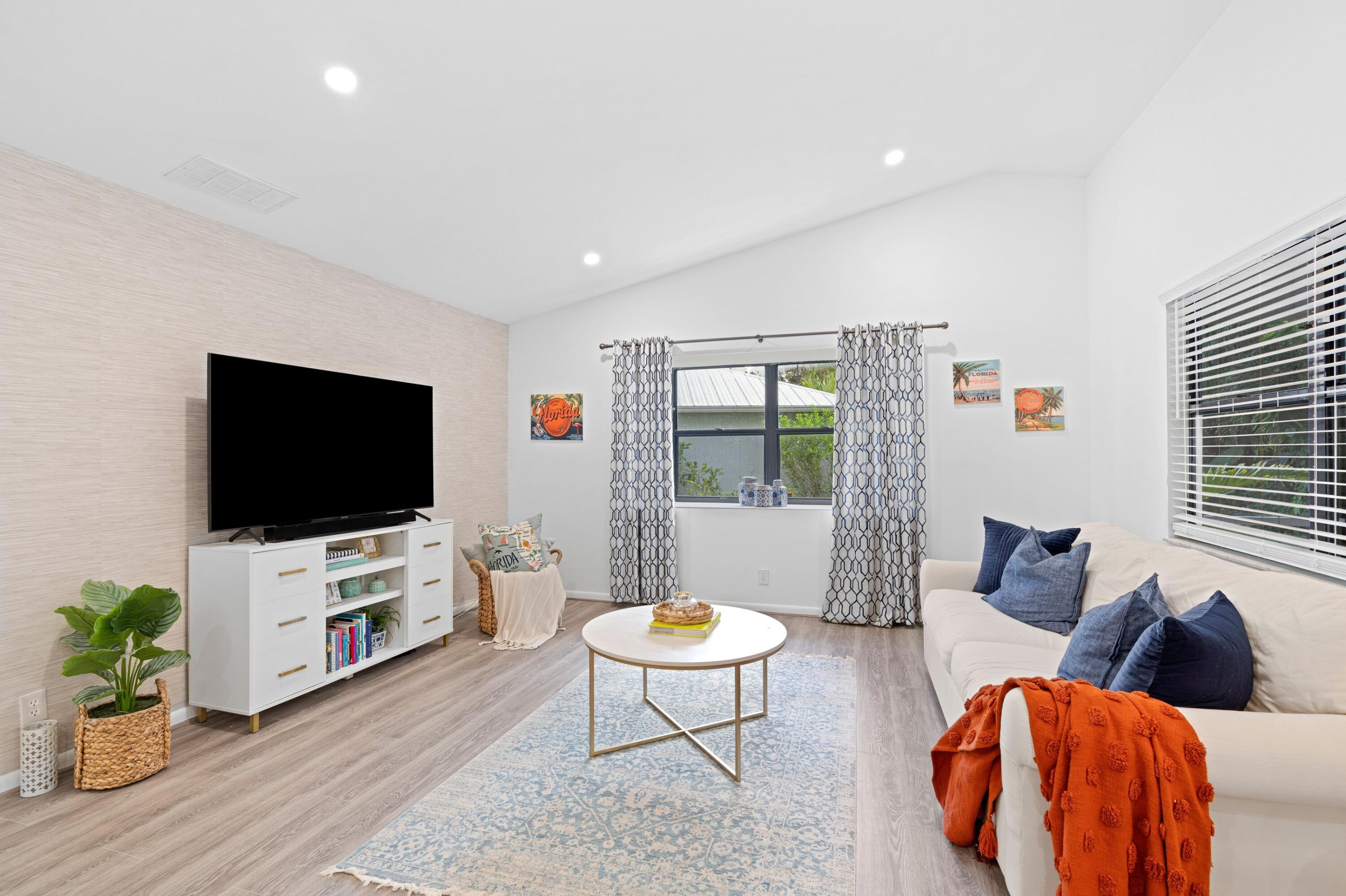 6894 Southeast Raintree Avenue Stuart, FL 34997 - Photo 3 of 24 Spacious Living Room