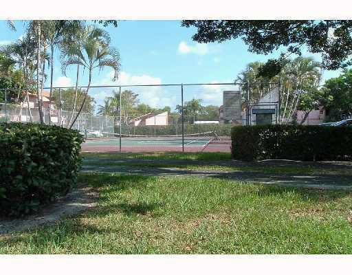 8310 Sands Point Boulevard, Unit 103L Tamarac, FL 33321 - Photo 12 of 12 Tennis Court