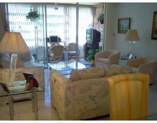 8310 Sands Point Boulevard, Unit 103L Tamarac, FL 33321 - Photo 2 of 12 Living Room