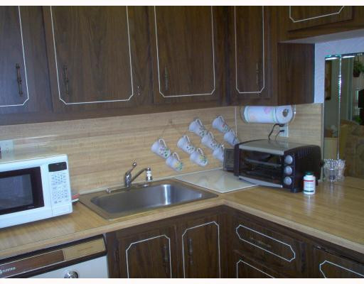 8310 Sands Point Boulevard, Unit 103L Tamarac, FL 33321 - Photo 4 of 12 Kitchen