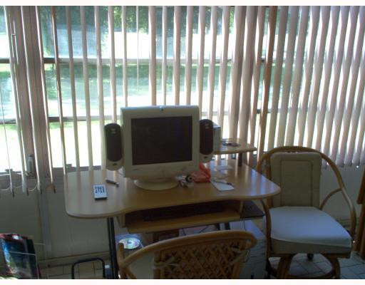 8310 Sands Point Boulevard, Unit 103L Tamarac, FL 33321 - Photo 7 of 12 Den/Family/Great Room