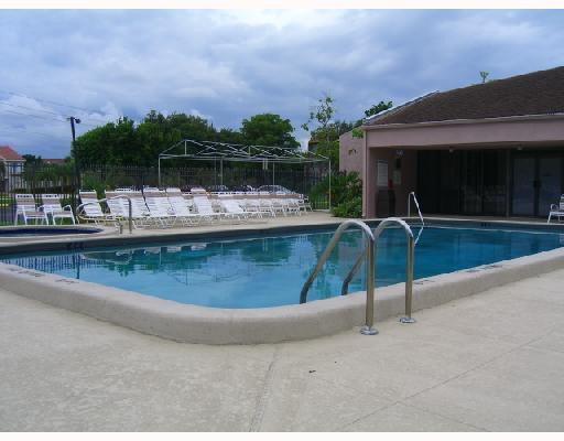 8310 Sands Point Boulevard, Unit 103L Tamarac, FL 33321 - Photo 8 of 12 Swimming Pool/Hot Tub/Sauna