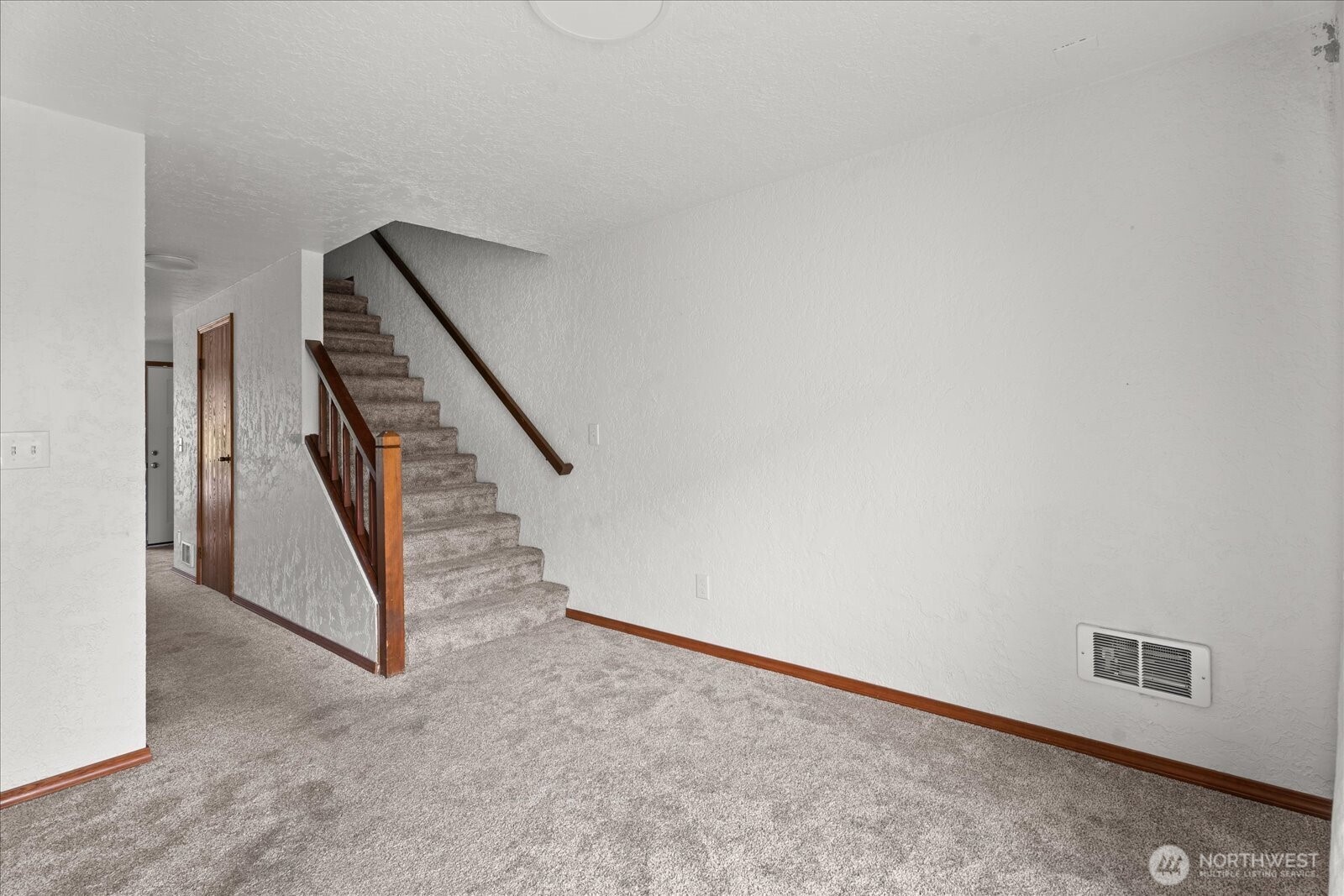 12600 4th Avenue West, Unit 7H Everett, WA 98204 - Photo 11 of 30 a view of a big room with stairs and stairs