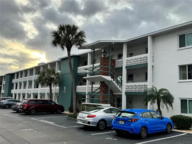 a car parked in front of a building