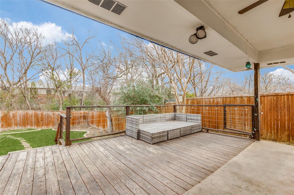 2749 Buna Drive Dallas, TX 75211 - Photo 11 of 12 Wooden deck featuring a fenced backyard and a ceiling fan