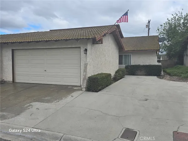 a view of garage and a garage