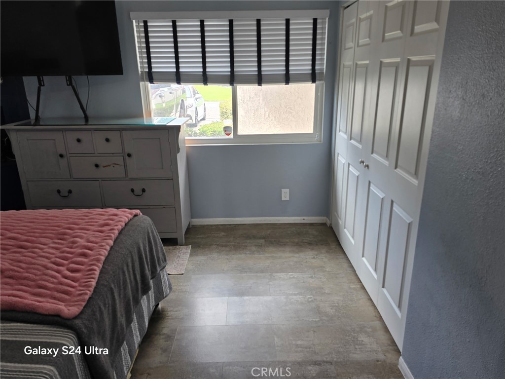 11504 Los Molinos Way Riverside, CA 92505 - Photo 20 of 40 a bed room with a bed and a window