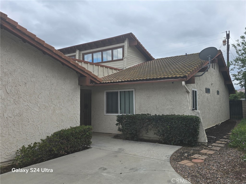 11504 Los Molinos Way Riverside, CA 92505 - Photo 2 of 40 a front view of a house with garden