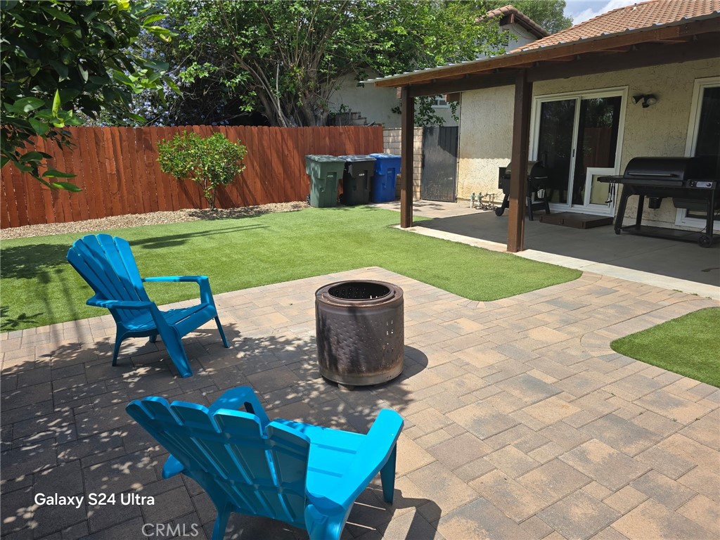 11504 Los Molinos Way Riverside, CA 92505 - Photo 30 of 40 a patio with table and chairs