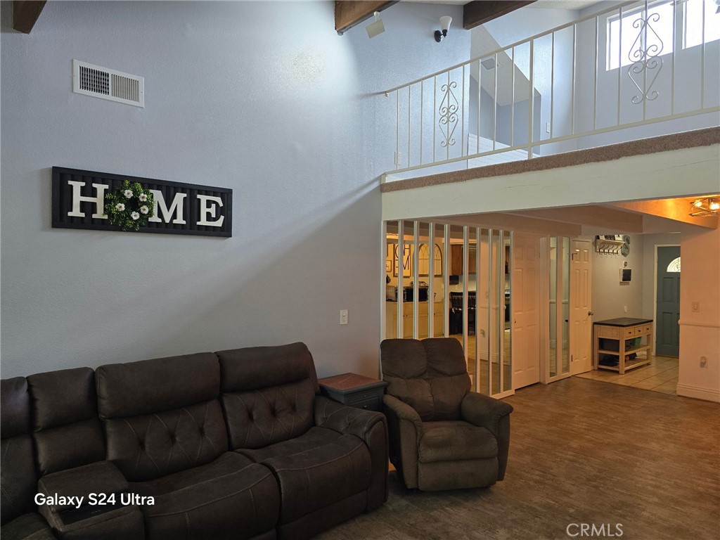 11504 Los Molinos Way Riverside, CA 92505 - Photo 3 of 40 a living room with furniture and a window