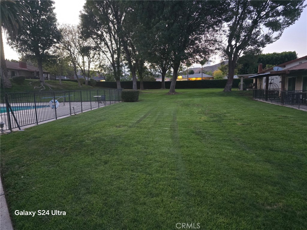 11504 Los Molinos Way Riverside, CA 92505 - Photo 34 of 40 a view of a backyard with large trees