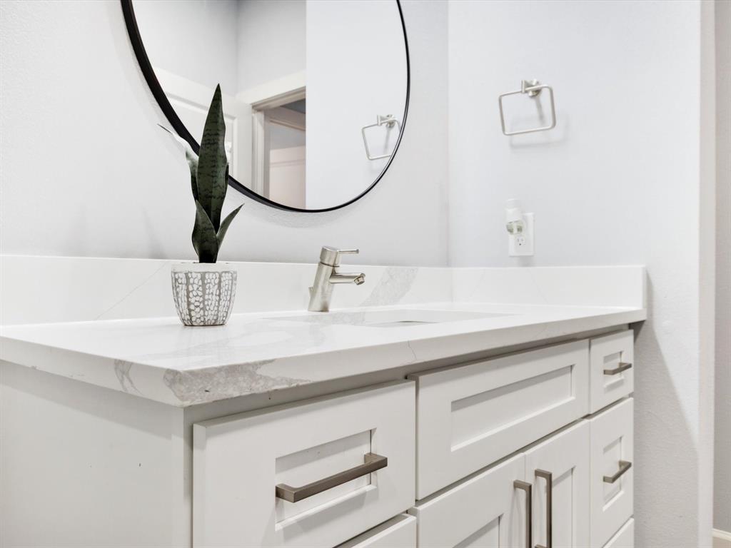4705 Point La Vista Road Malakoff, TX 75148 - Photo 6 of 40 White shaker-style vanity with multiple drawers and cabinet storage