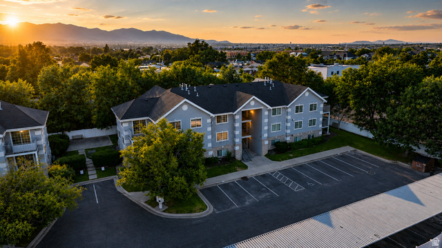 30 West 7500th Street South, Unit 18 Midvale, UT 84047 - Photo 1 of 14 Multi-story residential building with light blue siding and dark shingle roofing
