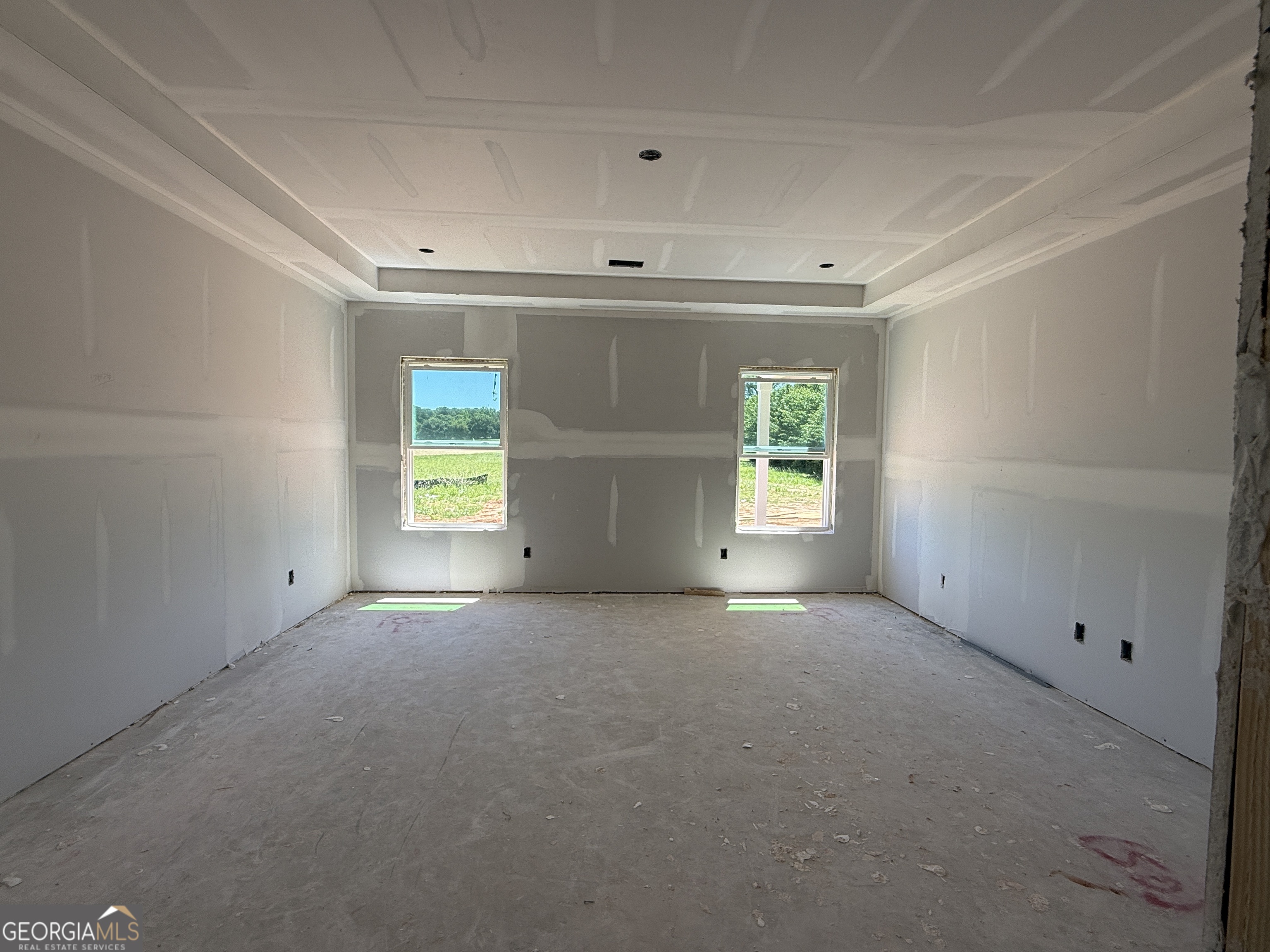 10 Rex Road Williamson, GA 30292 - Photo 13 of 63 an empty room with windows