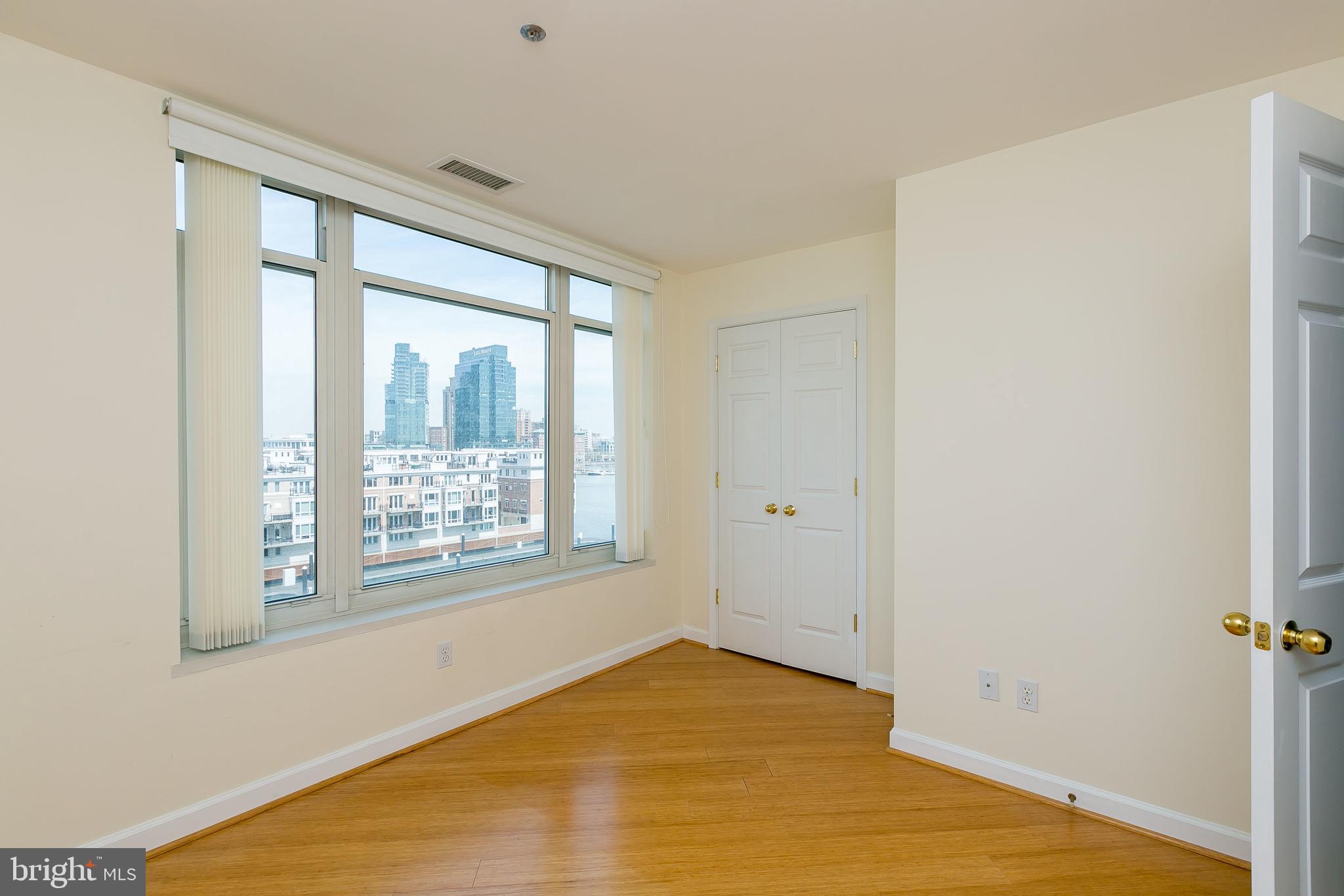 100 Harborview Drive, Unit 513 Baltimore, MD 21230 - Photo 11 of 58 a view of an empty room with a window