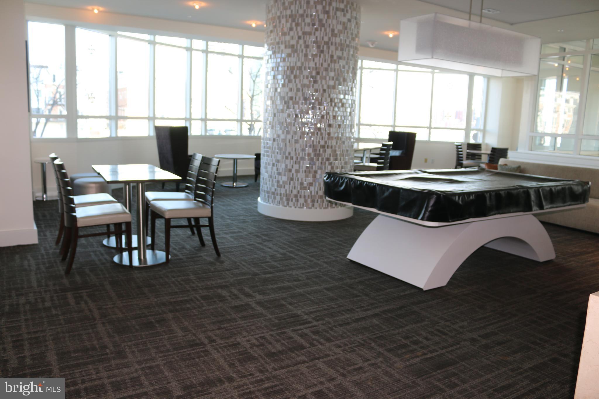 100 Harborview Drive, Unit 513 Baltimore, MD 21230 - Photo 41 of 58 a view of a dining room with furniture window and outside view