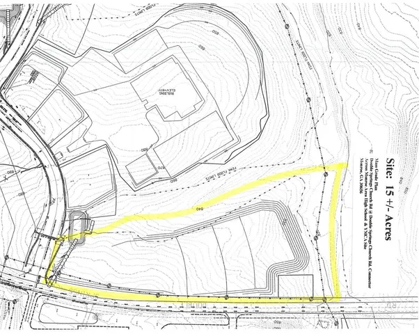 a view of a swimming pool with a bench and trees