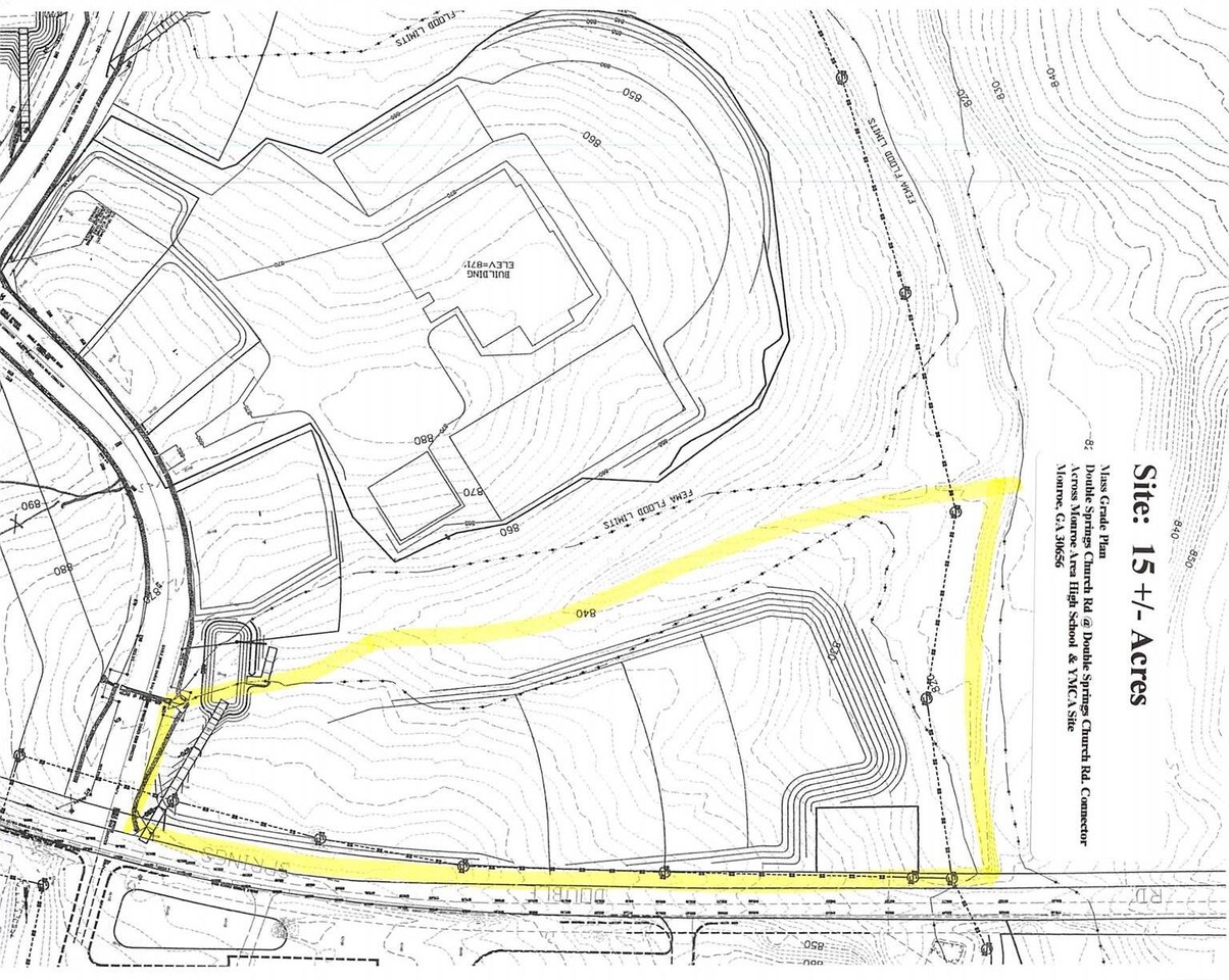 a view of a swimming pool with a bench and trees