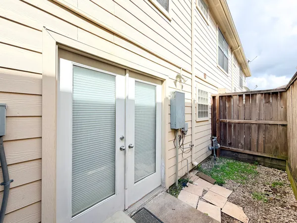 a view of a porch with wooden floor