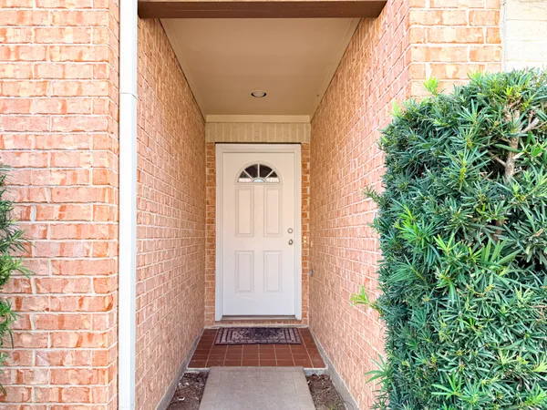 a view of a house with a street