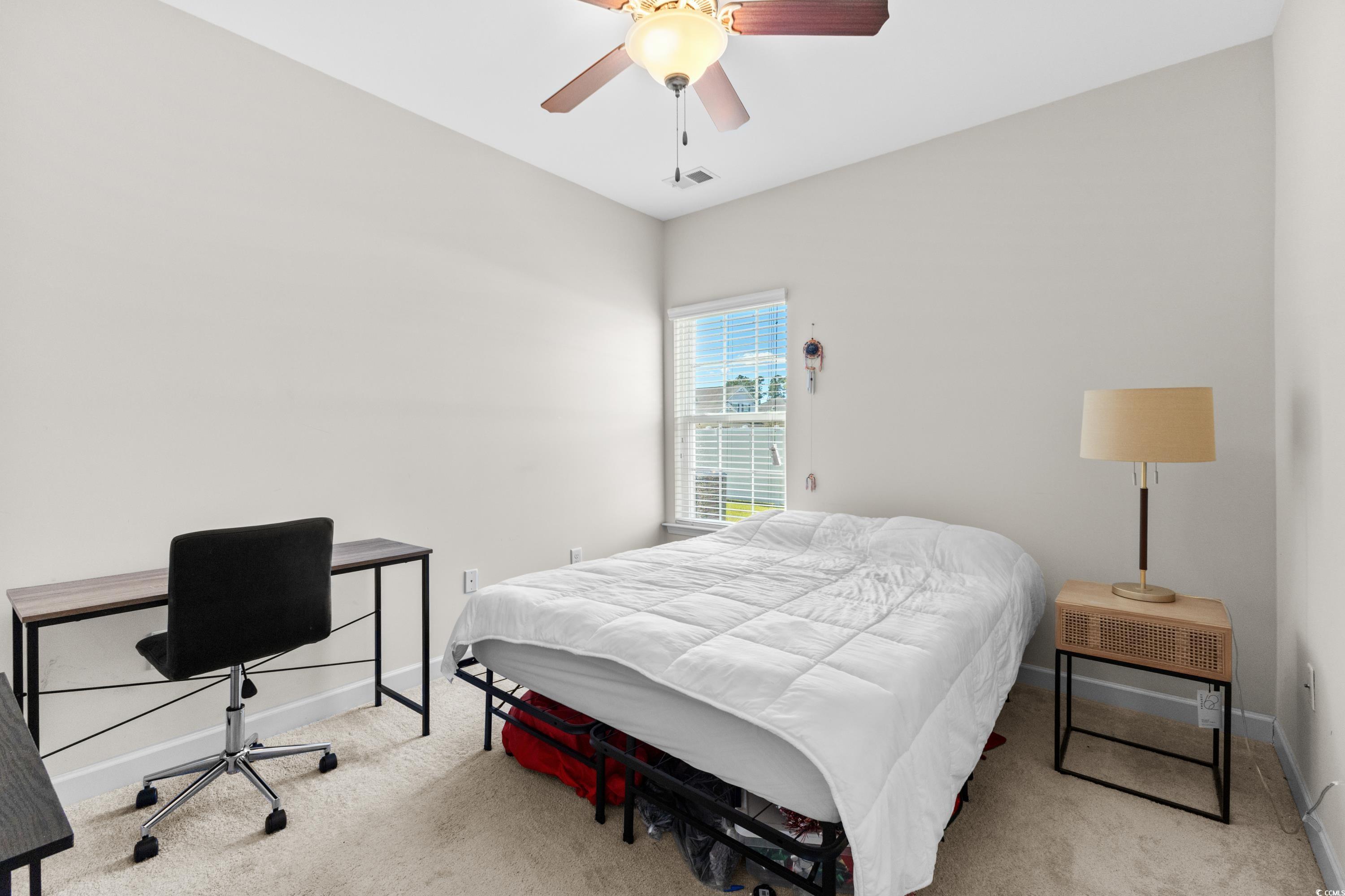 354 Ridge Point Drive Conway, SC 29526 - Photo 18 of 37 Carpeted bedroom with ceiling fan