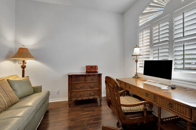 a workspace with furniture and lamp