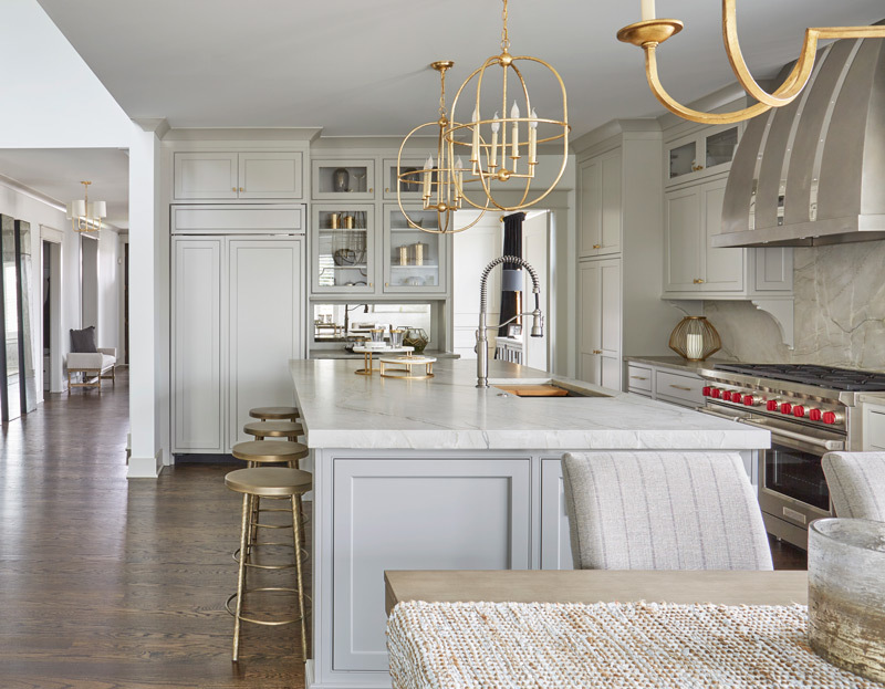 5585 Barton Lane Hinsdale, IL 60521 - Photo 4 of 20 a kitchen with stainless steel appliances granite countertop a sink dishwasher and a dining table with wooden floor
