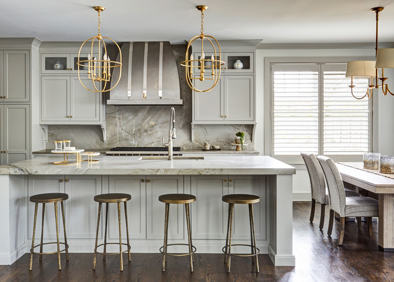 5585 Barton Lane Hinsdale, IL 60521 - Photo 5 of 20 a kitchen with stainless steel appliances granite countertop a dining table chairs and white cabinets