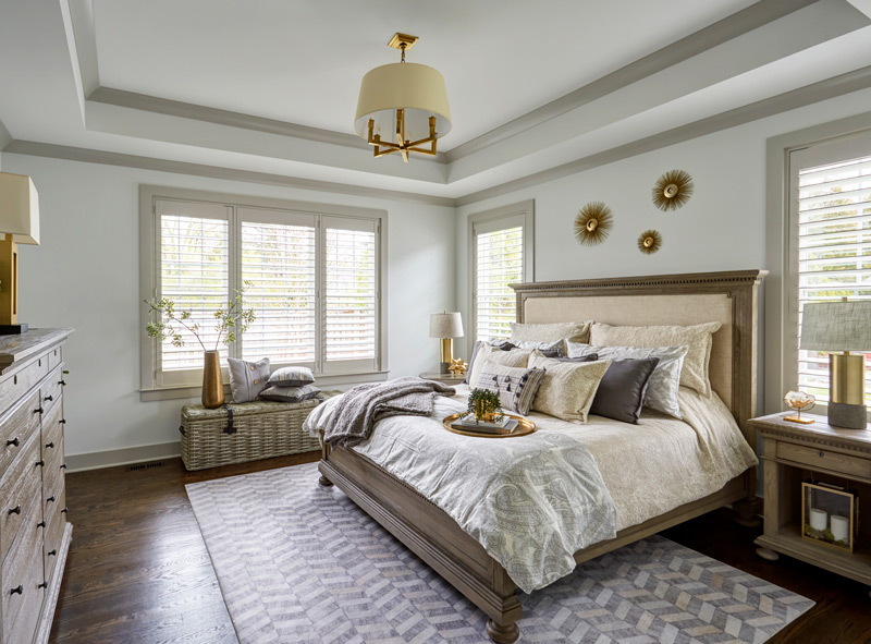 5585 Barton Lane Hinsdale, IL 60521 - Photo 8 of 20 a bedroom with bed and a chandelier