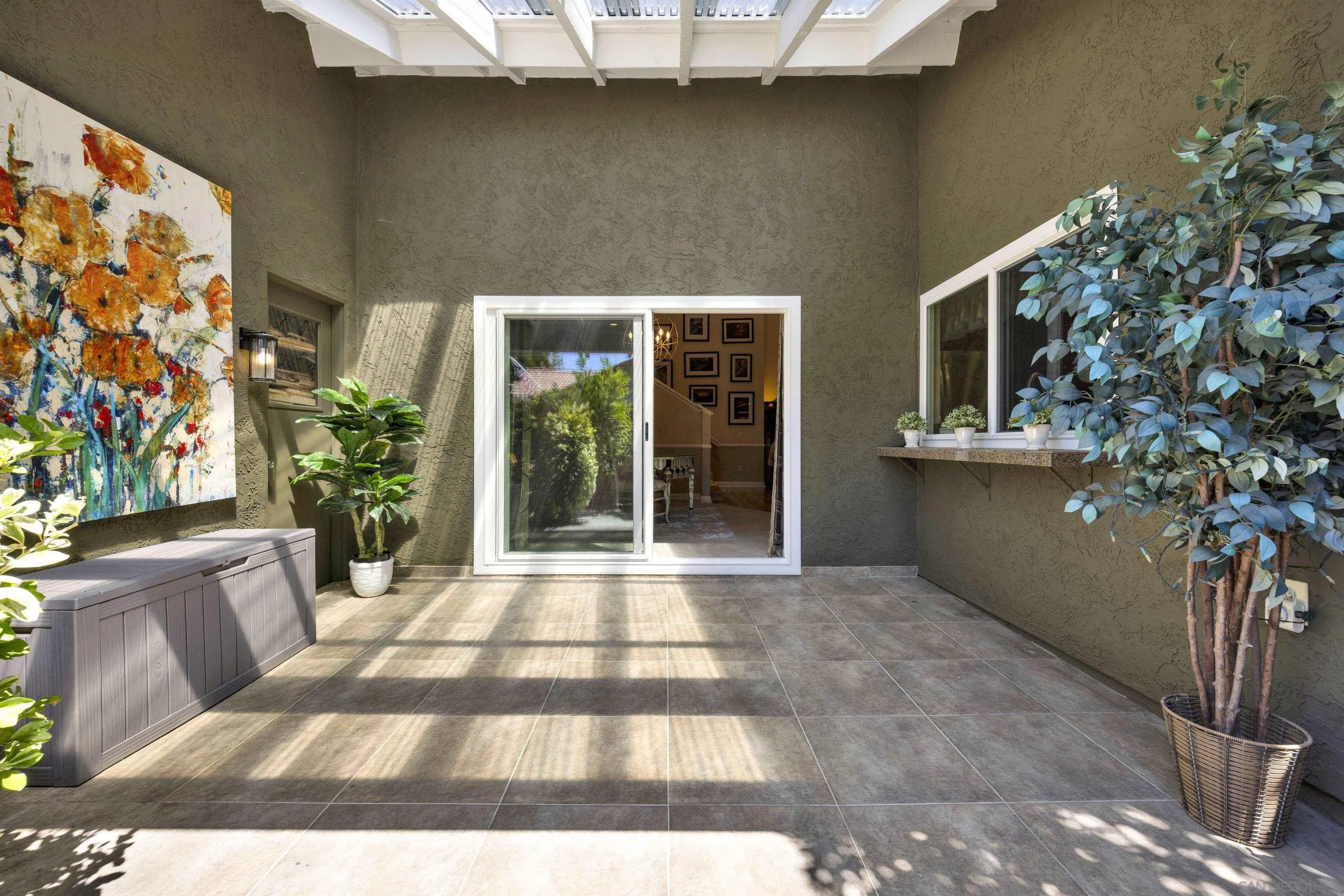17233 Cuvee Court Poway, CA 92064 - Photo 16 of 53 a view of backyard with seating space and potted plants