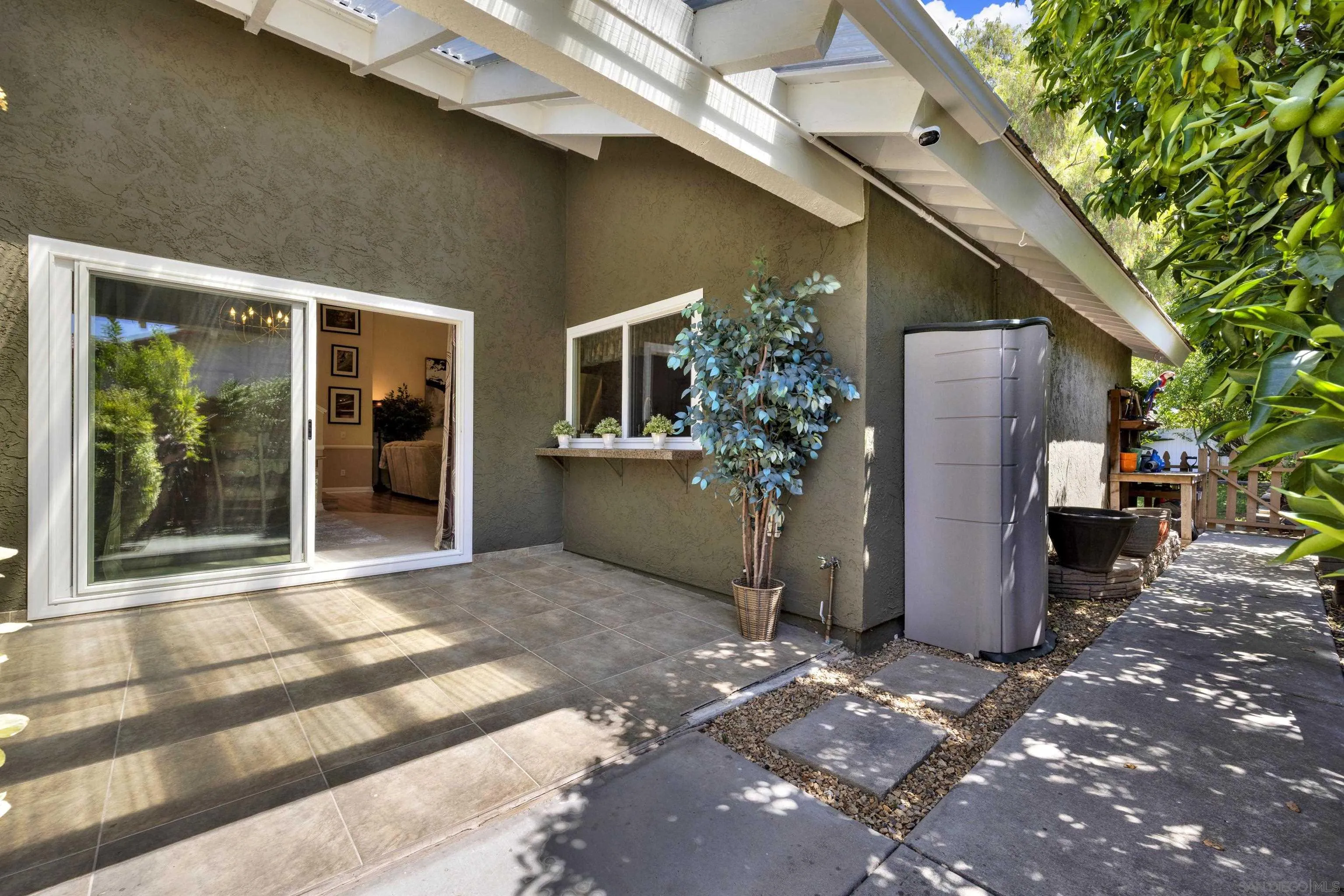 17233 Cuvee Court Poway, CA 92064 - Photo 17 of 53 a view of a house with backyard and sitting area