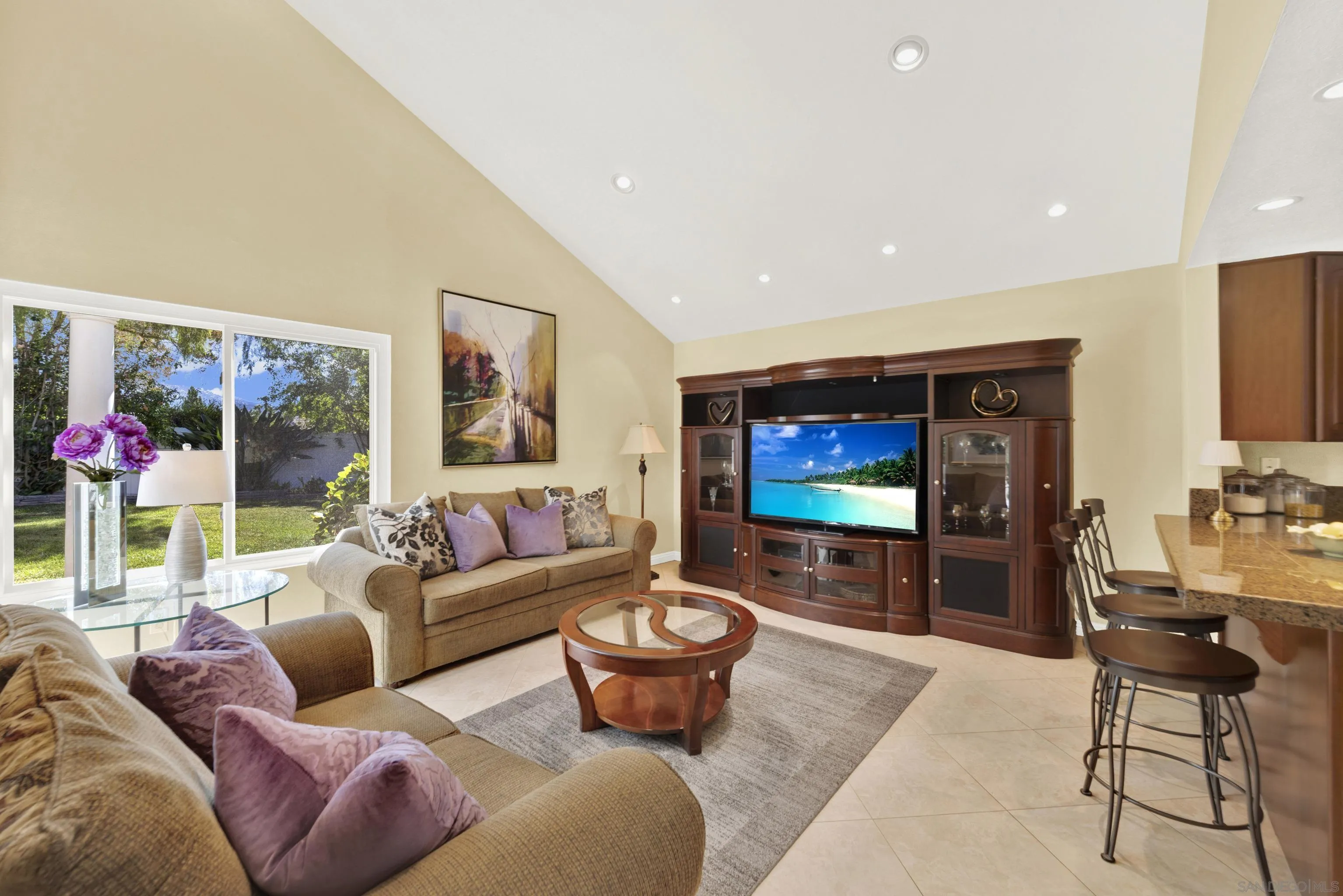 17233 Cuvee Court Poway, CA 92064 - Photo 19 of 53 a living room with furniture a rug and a flat screen tv