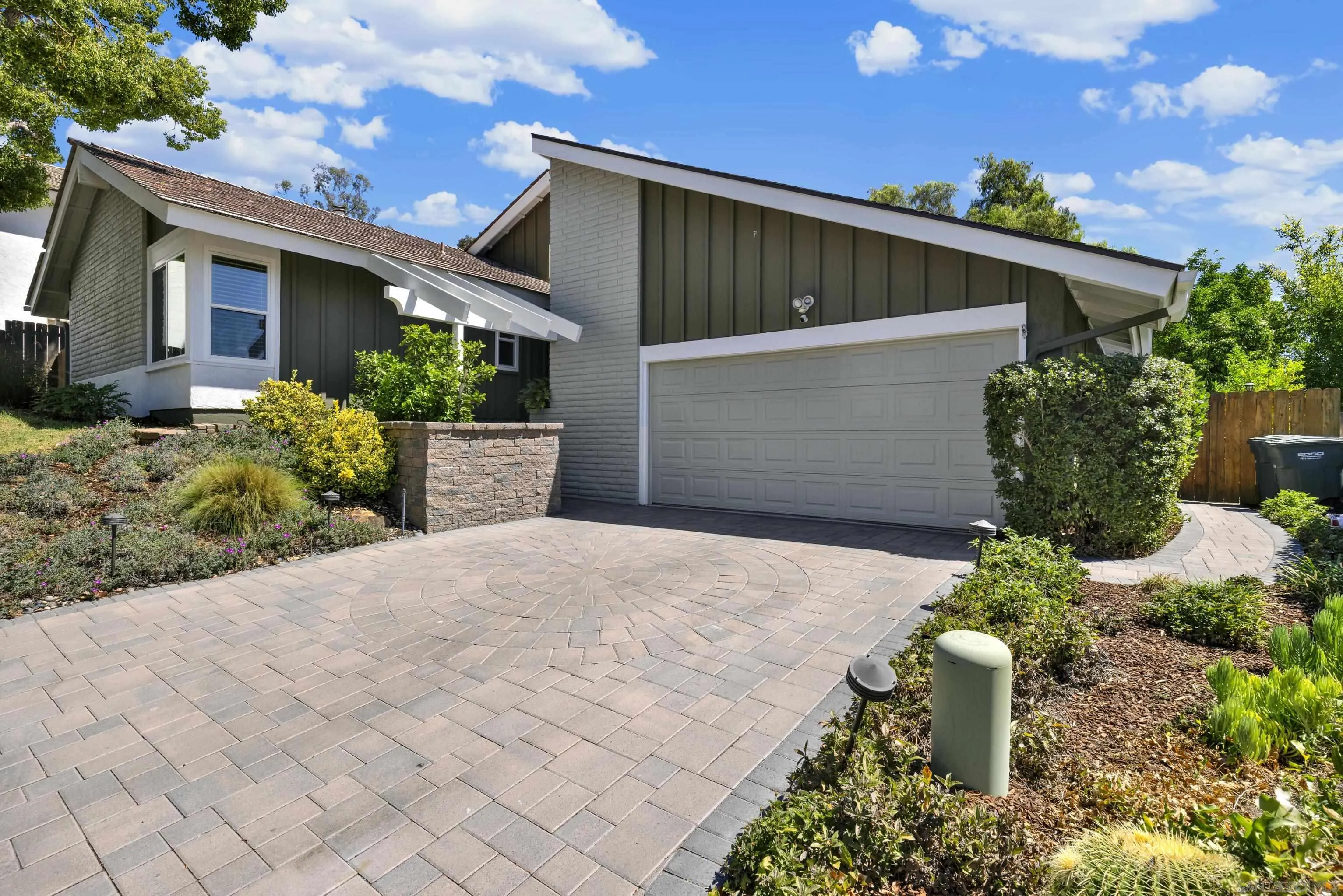 17233 Cuvee Court Poway, CA 92064 - Photo 2 of 53 a front view of house with garage and yard