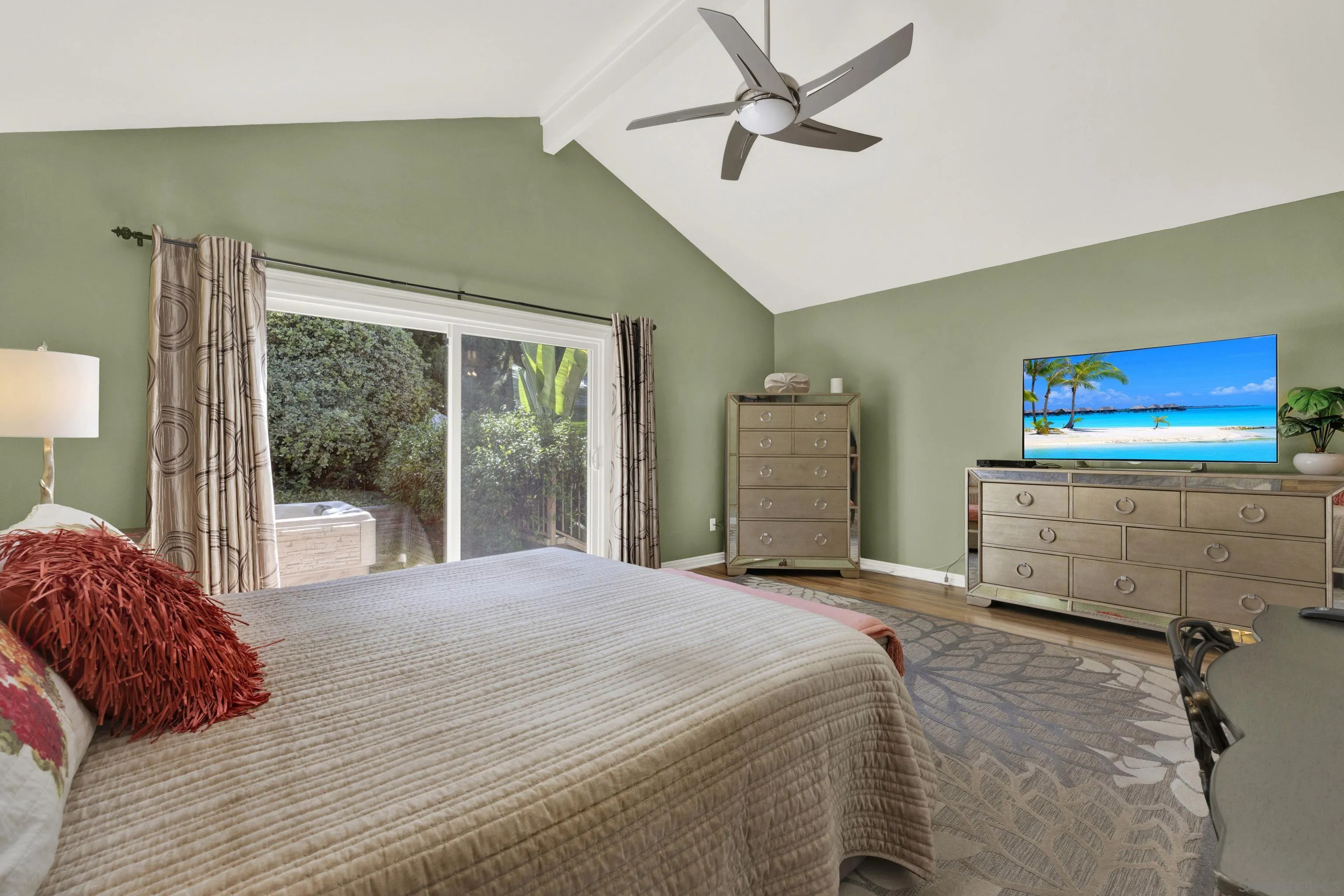 17233 Cuvee Court Poway, CA 92064 - Photo 24 of 53 a bedroom with a large bed and a flat tv screen on dresser
