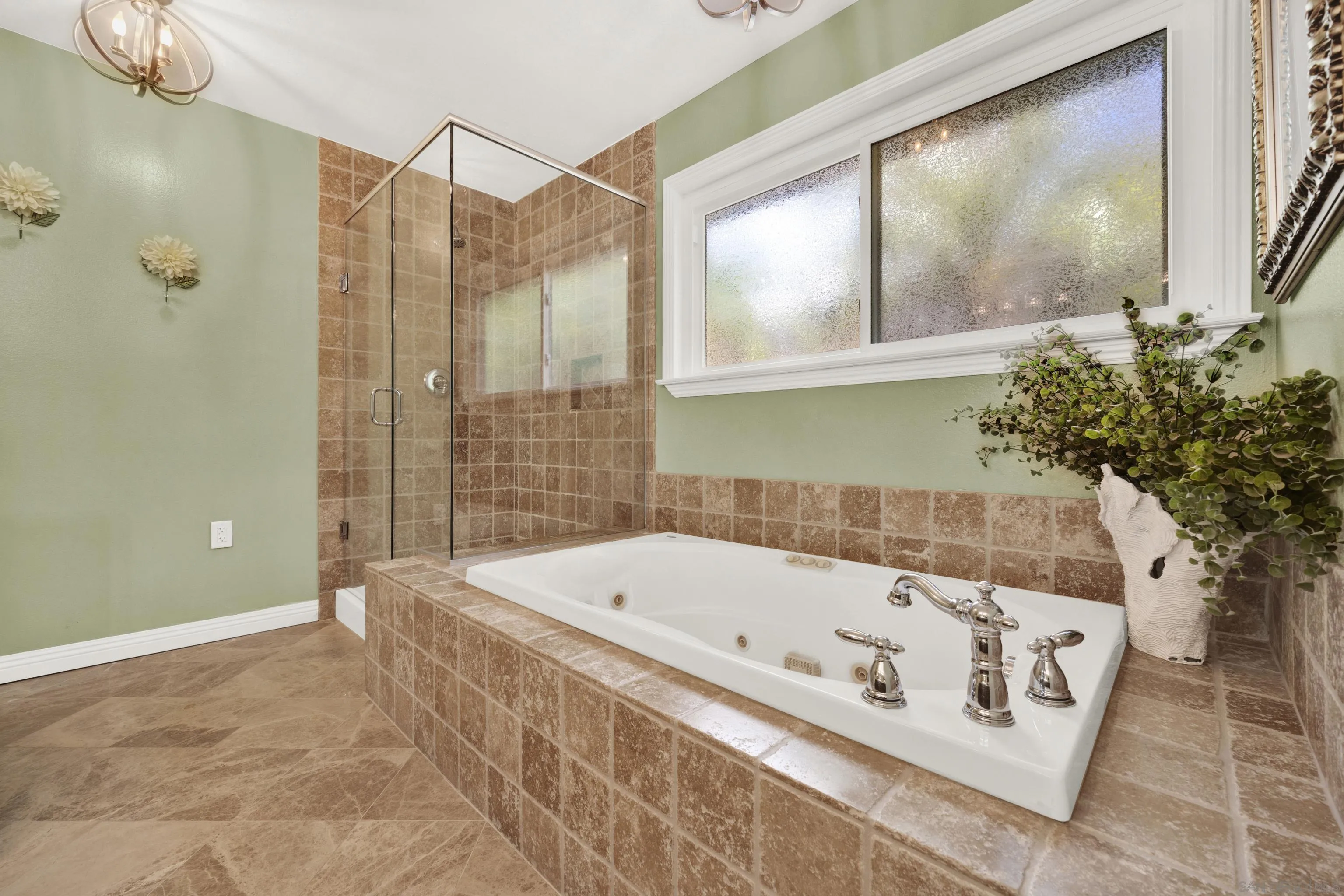 17233 Cuvee Court Poway, CA 92064 - Photo 26 of 53 a bathroom with a bathtub and a shower