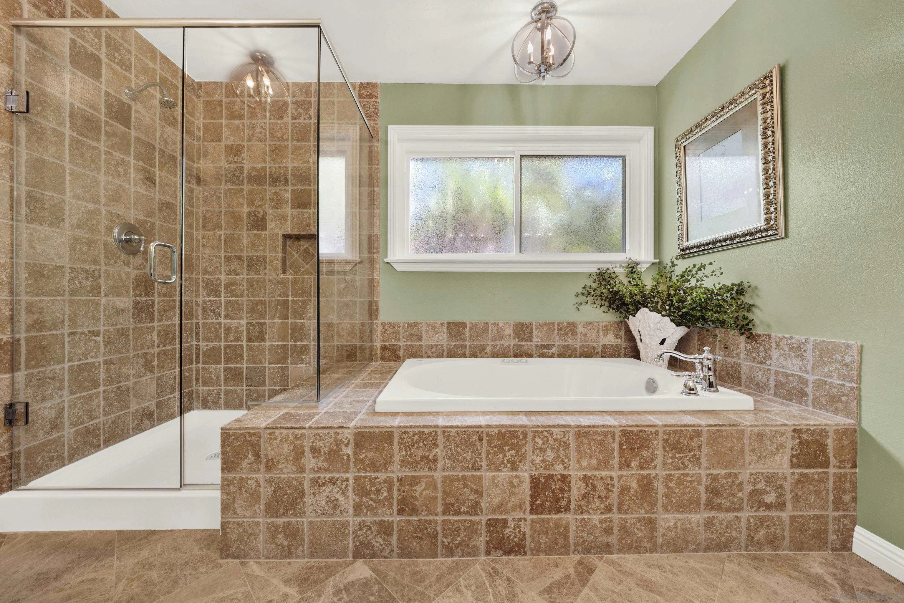 17233 Cuvee Court Poway, CA 92064 - Photo 27 of 53 a bathroom with a bathtub sink and window