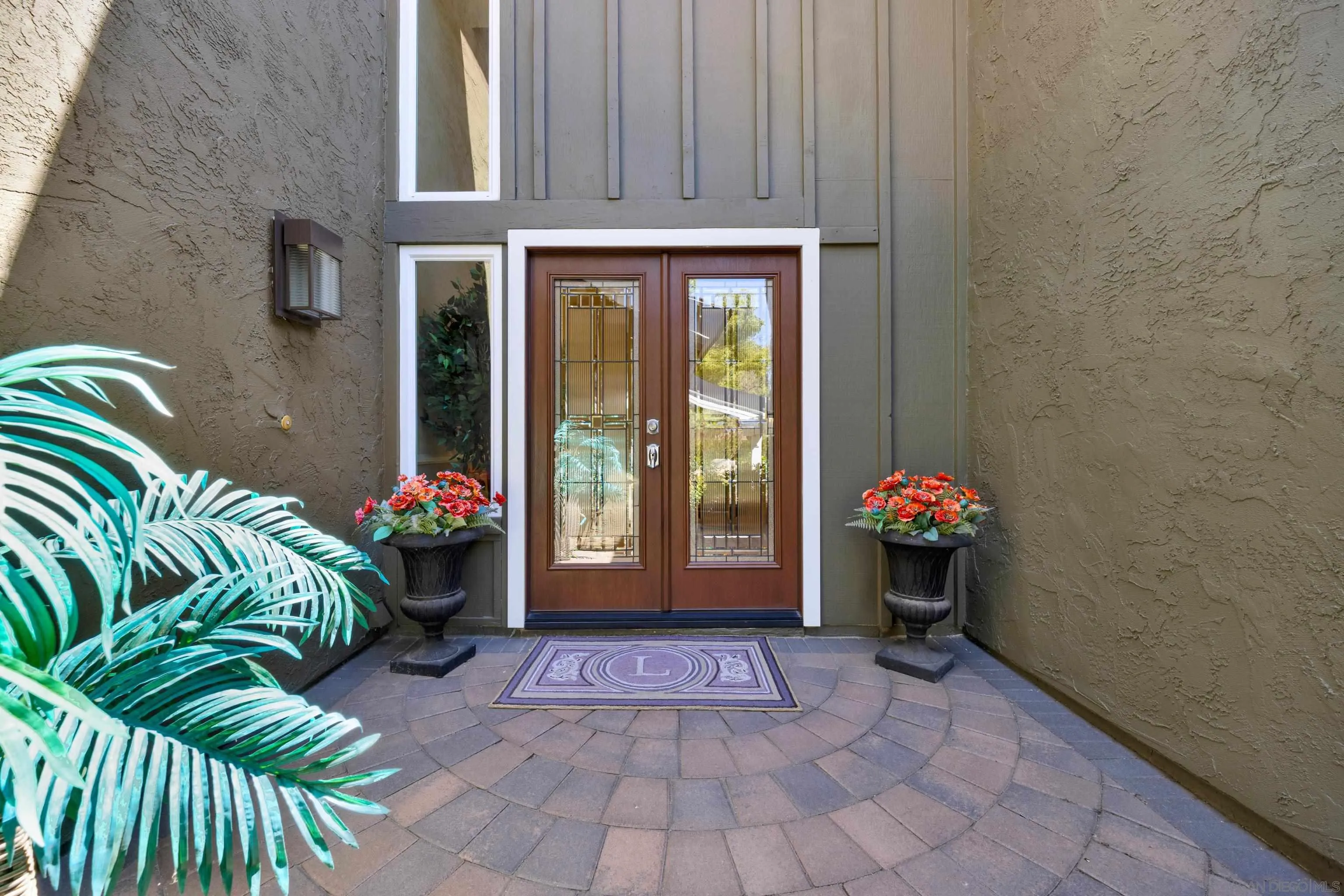 17233 Cuvee Court Poway, CA 92064 - Photo 3 of 53 a view of entryway with flower pots