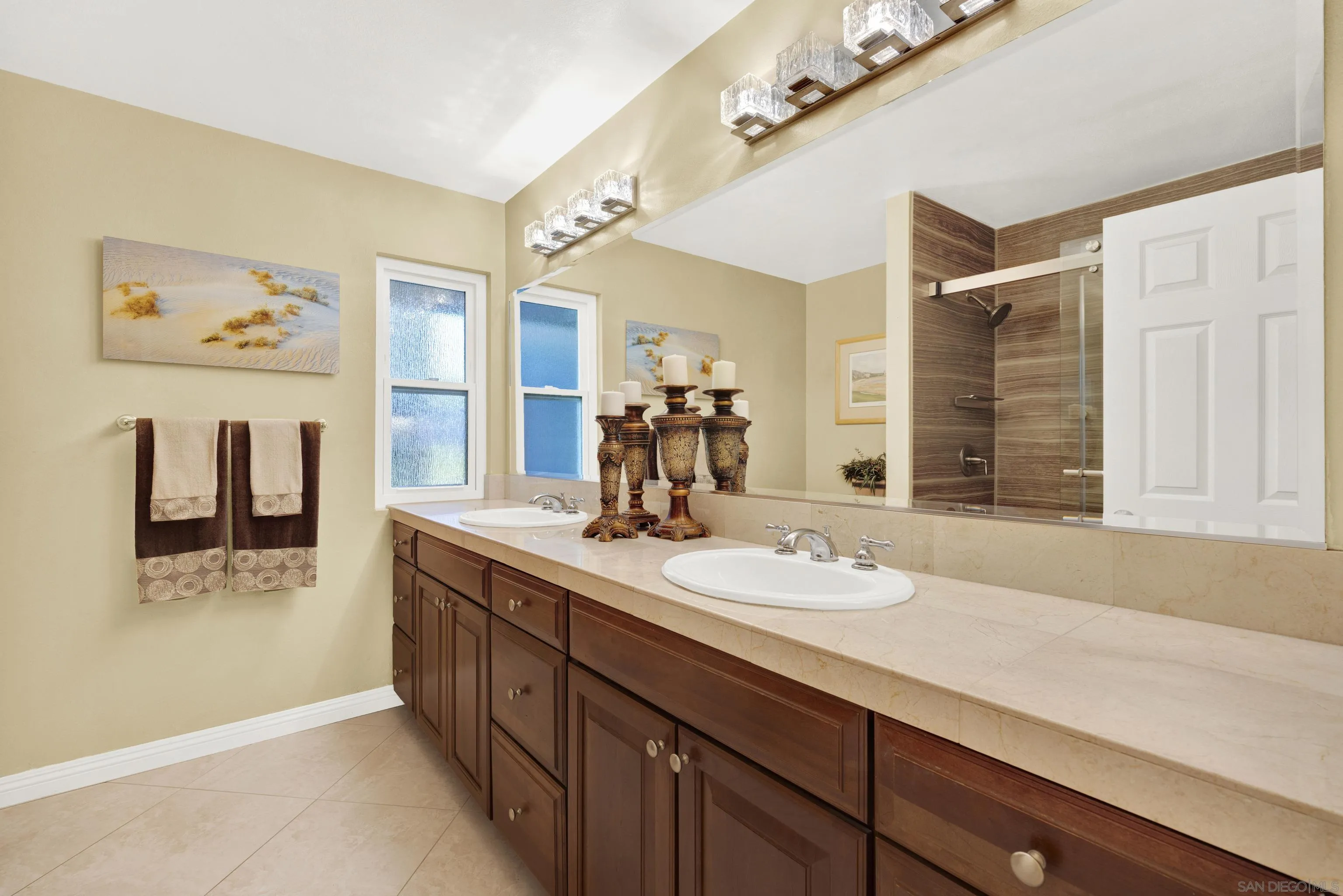 17233 Cuvee Court Poway, CA 92064 - Photo 36 of 53 a bathroom with a sink double vanity and a mirror