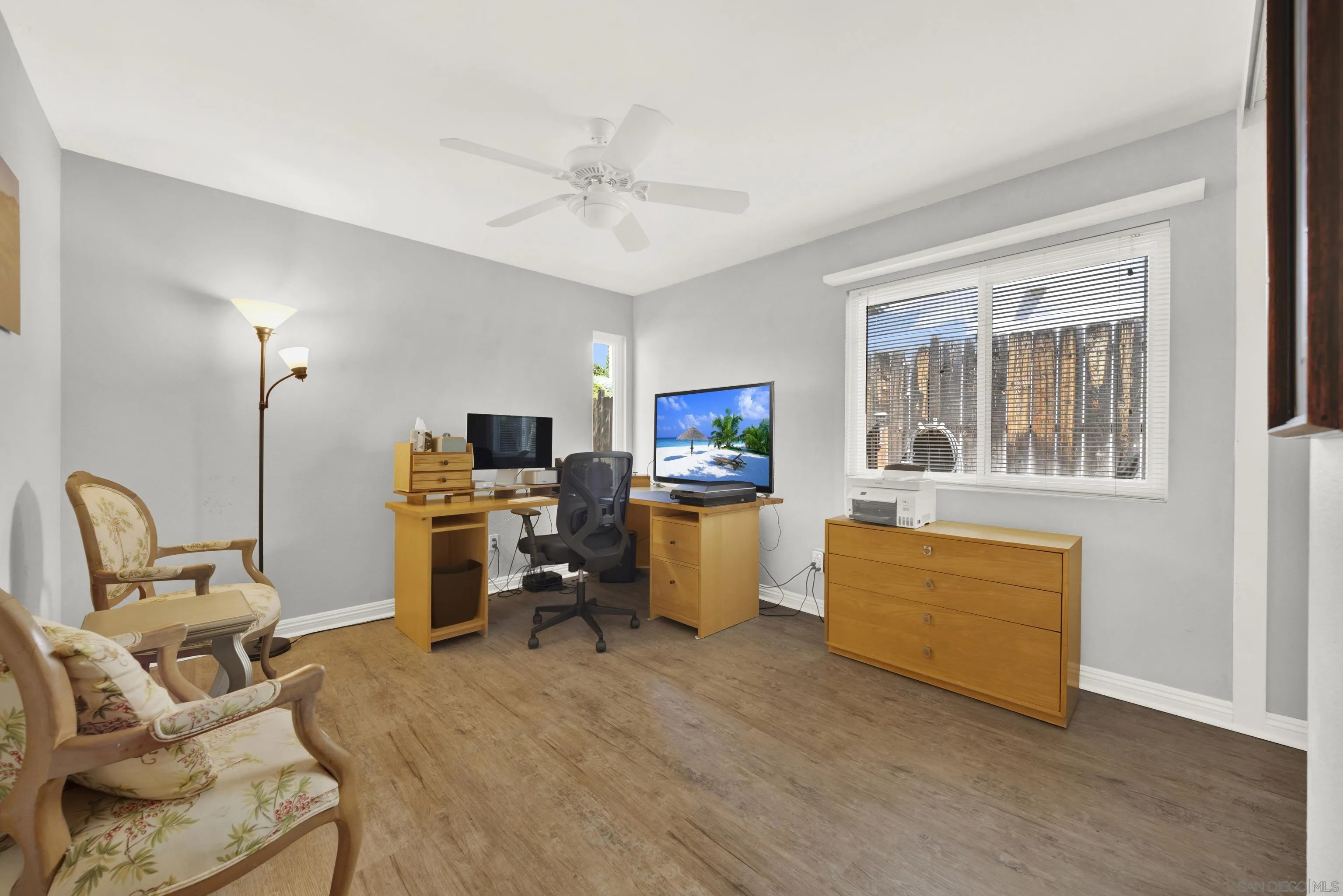 17233 Cuvee Court Poway, CA 92064 - Photo 40 of 53 a living room with furniture and a flat screen tv