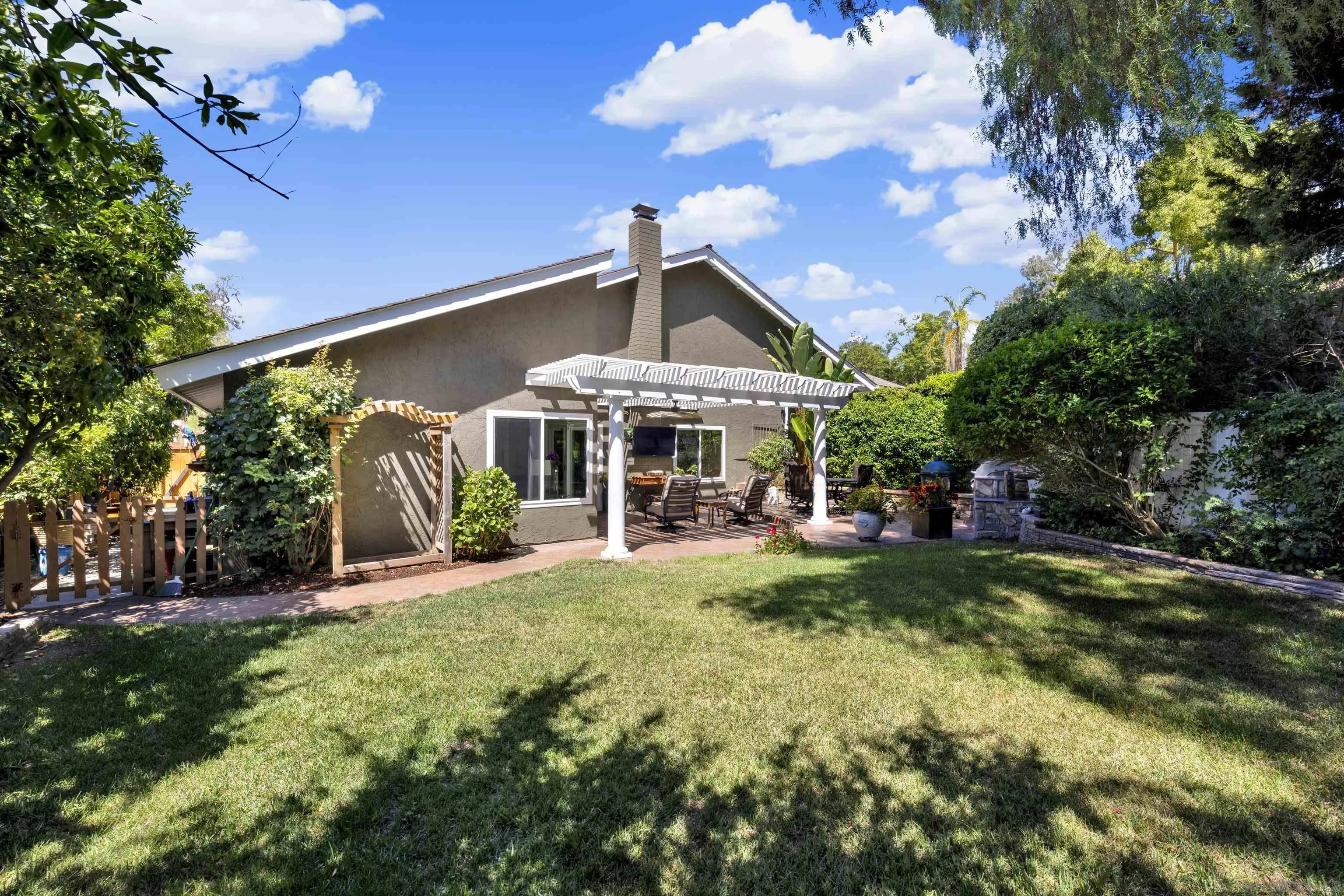 17233 Cuvee Court Poway, CA 92064 - Photo 43 of 53 a view of a house with a yard porch and sitting area