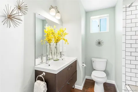 a bathroom with a toilet and a sink
