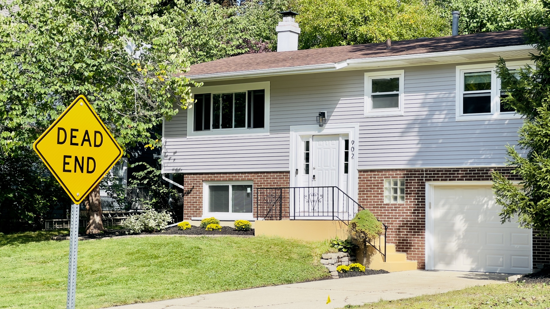 902 Woodland Road Wauconda, IL 60084 - Photo 1 of 28 a front view of a house with garden