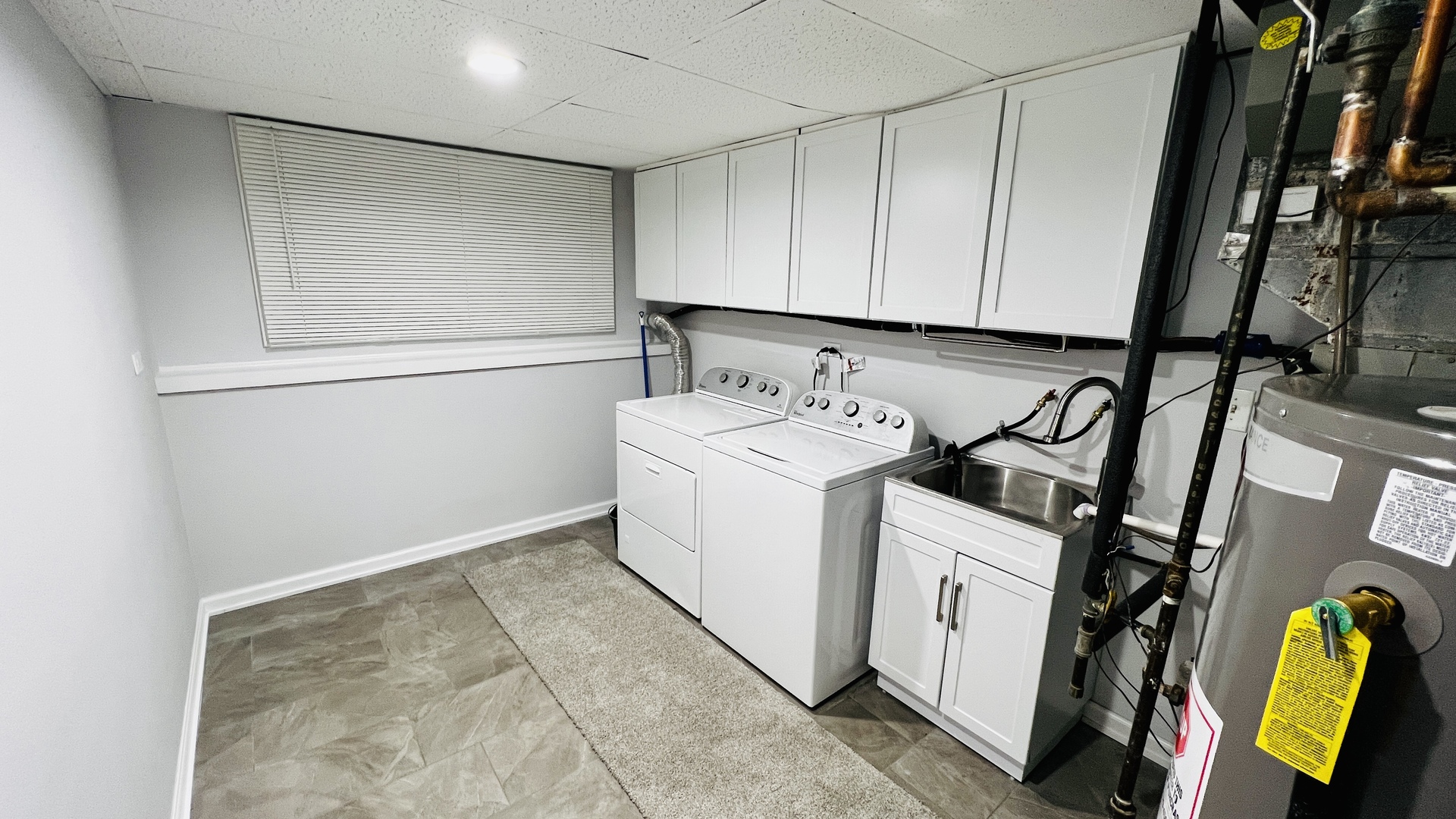 902 Woodland Road Wauconda, IL 60084 - Photo 22 of 28 a utility room with dryer and washer