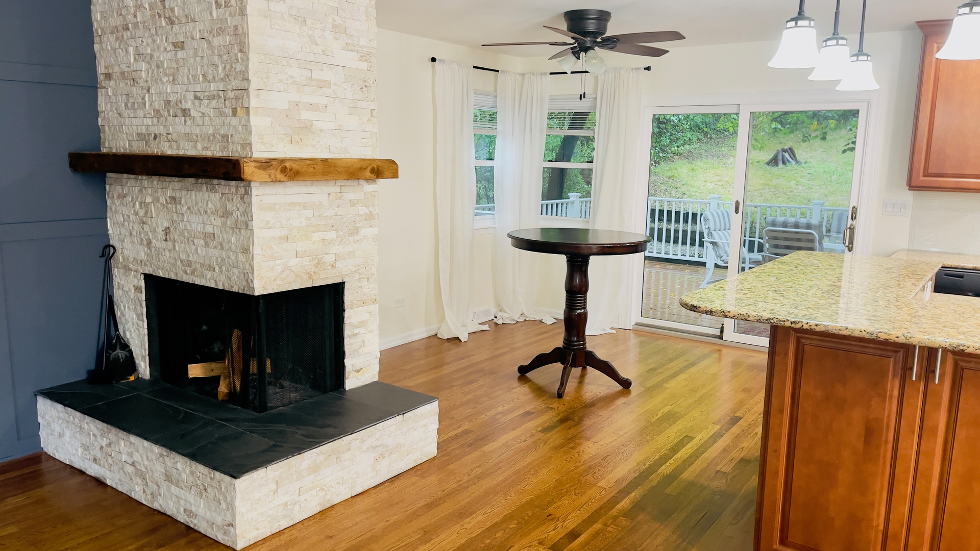 902 Woodland Road Wauconda, IL 60084 - Photo 10 of 28 a living room with furniture and a fireplace