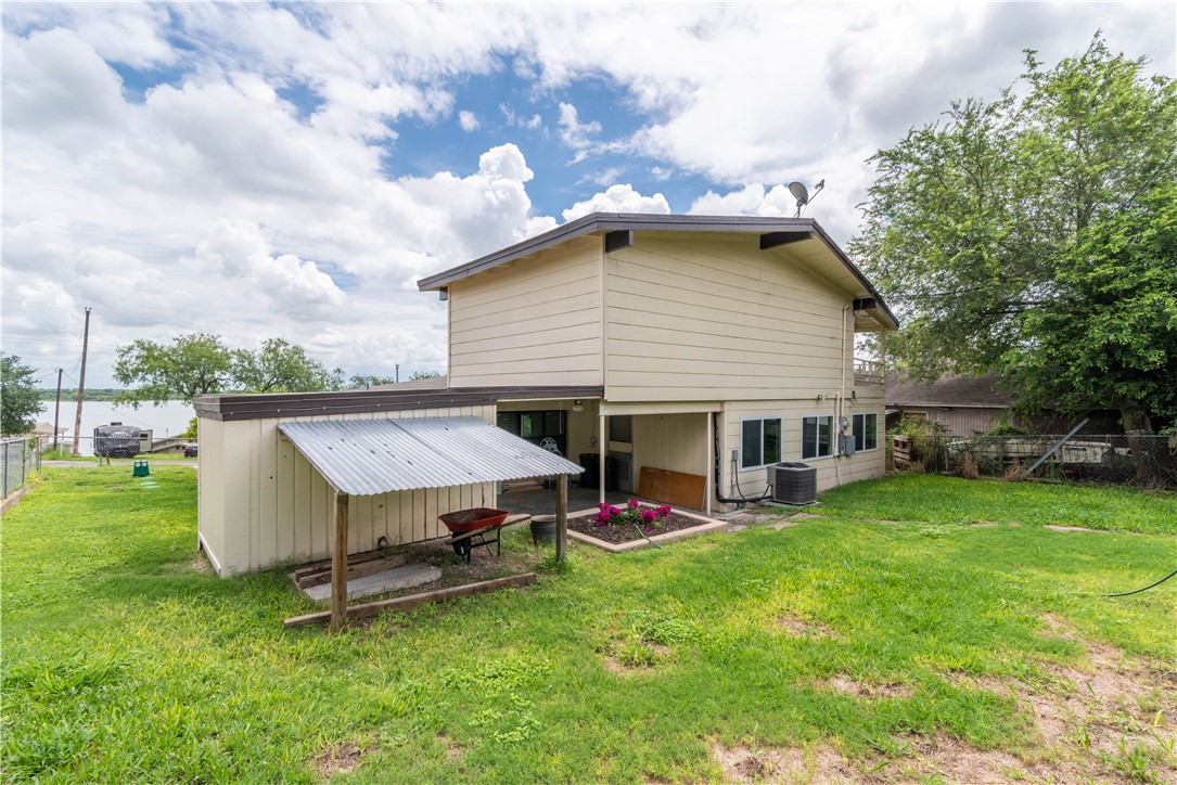 143 Trail Ridge Drive Sandia, TX 78383 - Photo 29 of 40 a view of a house with a backyard and sitting area