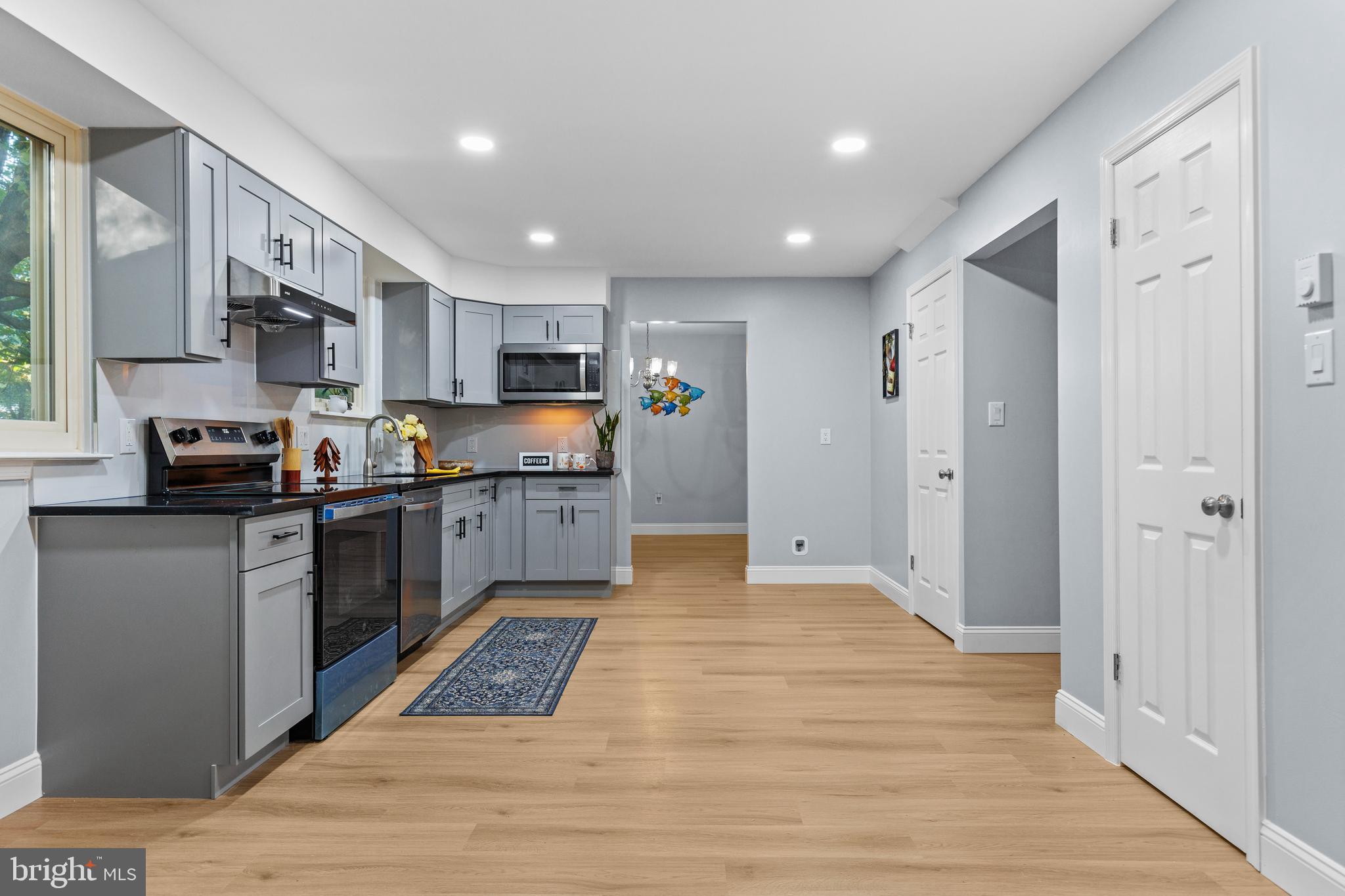 4103 Forrest Road Mount Joy, PA 17552 - Photo 14 of 50 a kitchen with stainless steel appliances granite countertop a refrigerator and a stove top oven