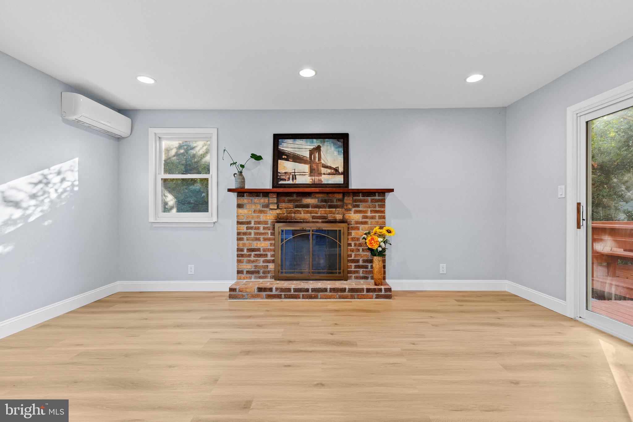 4103 Forrest Road Mount Joy, PA 17552 - Photo 15 of 50 a view of a livingroom with a fireplace and window
