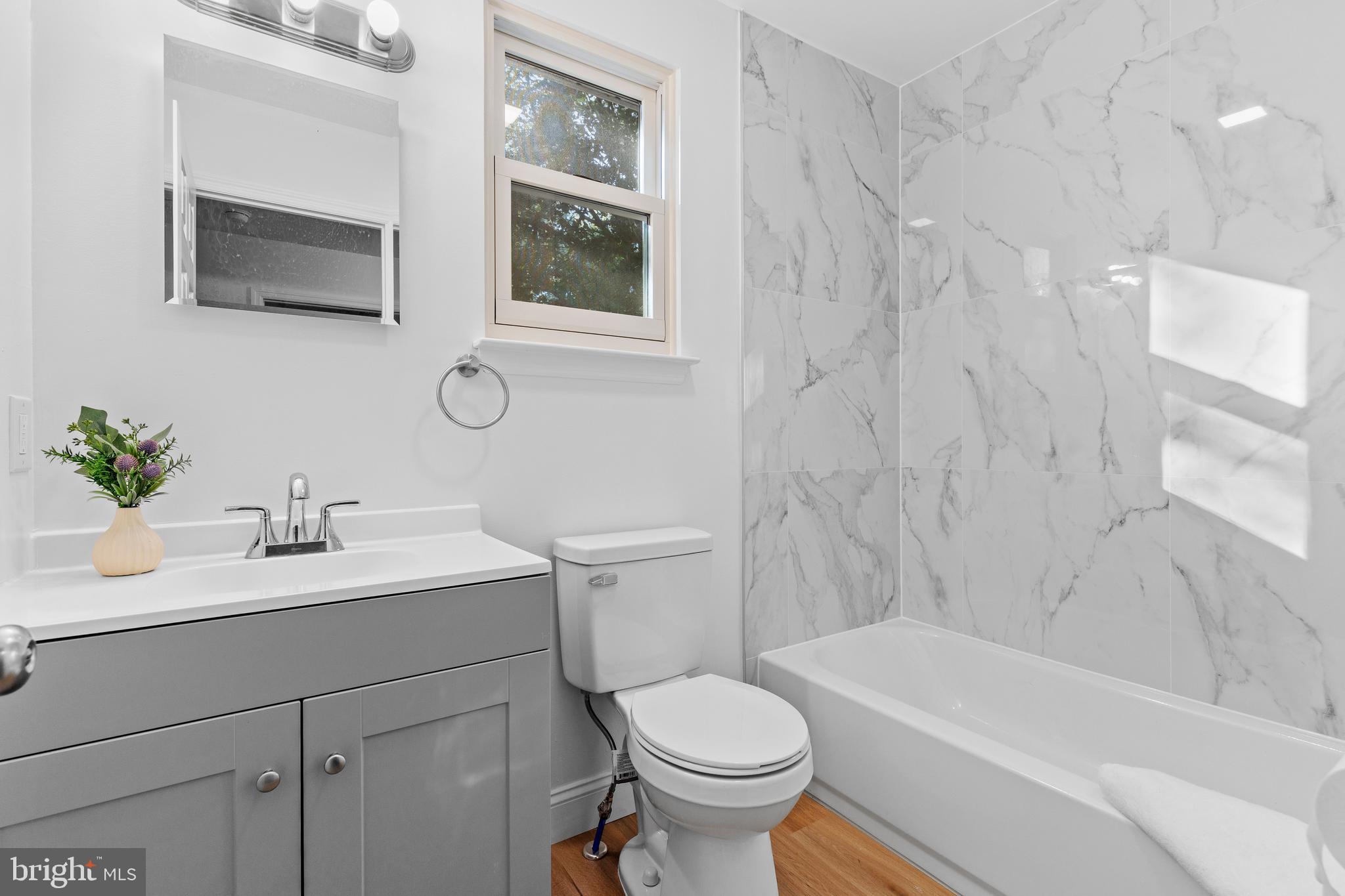 4103 Forrest Road Mount Joy, PA 17552 - Photo 25 of 50 a bathroom with a sink toilet a mirror and shower